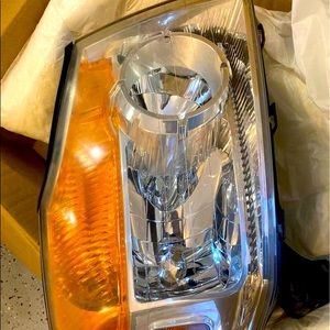 A pair of headlights for a Nissan Armada fits model 2010/2015 very good shape